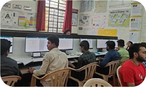Learners focused on computer-based accounting practice in a training lab